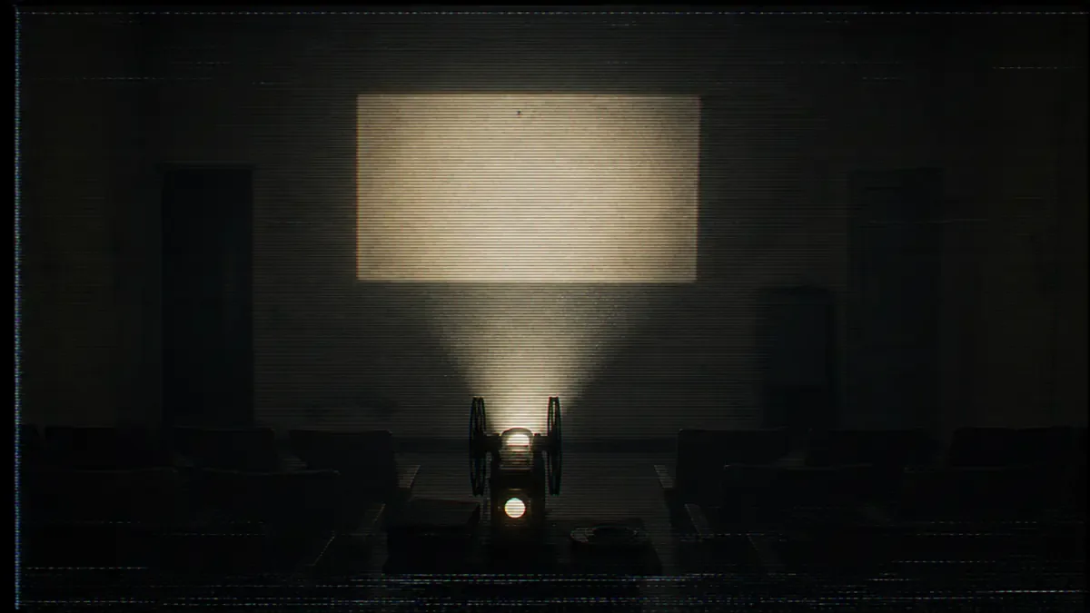 SuicideMouse.avi: proyector de cine antiguo proyectando un rectángulo blanco vacío sobre una pared oscura